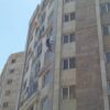 پیچ و رولپلاک نمای ساختمان شستشو بدون داربست راپل